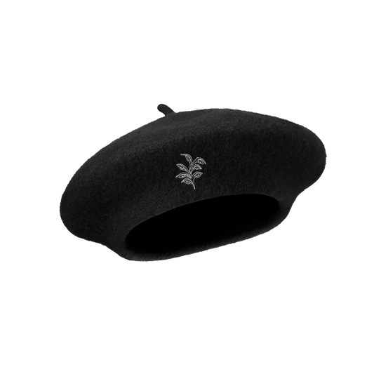 A classic black beret featuring the BANKS logo.