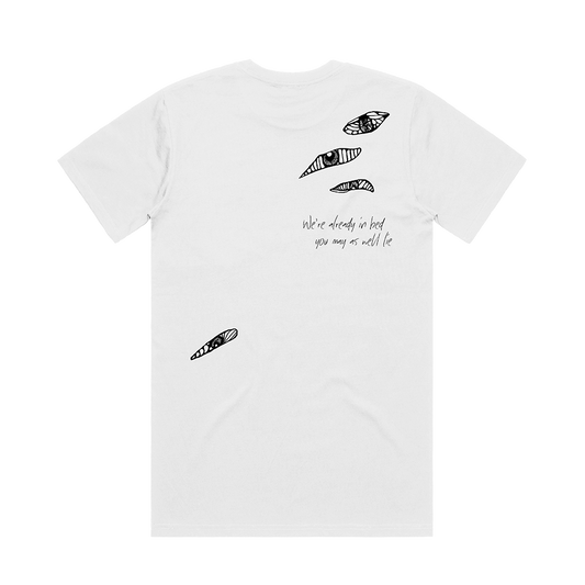 White t-shirt with eyes design on the back with "we're already in bed you may as well lie" text